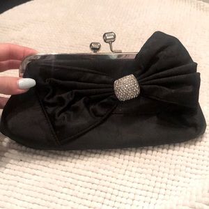 Black clutch with gem detail